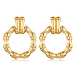 Elegant 18K gold-plated bamboo circle drop earrings, showcasing a chic and trendy design perfect for any occasion.