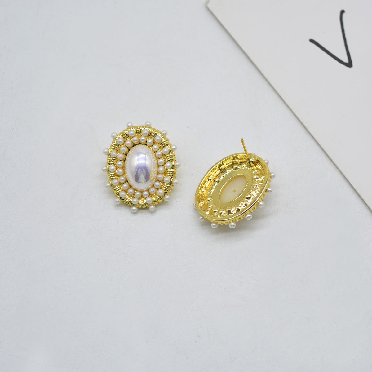 Pearl and 18K Gold-Plated Halo Oval Stud Earrings, gold stud earrings for women, botanical inspired, detail close-up