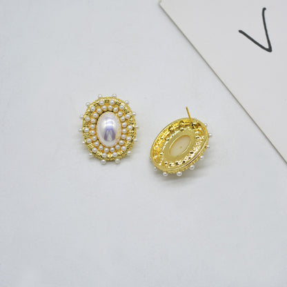 Pearl and 18K Gold-Plated Halo Oval Stud Earrings, gold stud earrings for women, botanical inspired, detail close-up