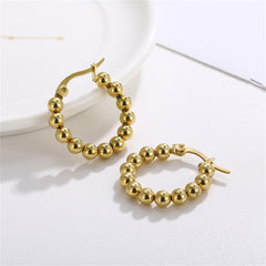 Stylish 18K gold-plated hoop earrings adorned with beautiful gold beads, perfect for elevating any outfit.