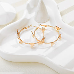 Chic 18K gold-plated butterfly hoop earrings, a must-have accessory that brings a whimsical touch to your look.