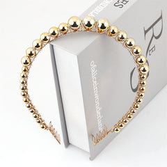 Gorgeous gold necklace with pearls and beads, an elegant statement piece made with 18K gold plating for timeless style.
