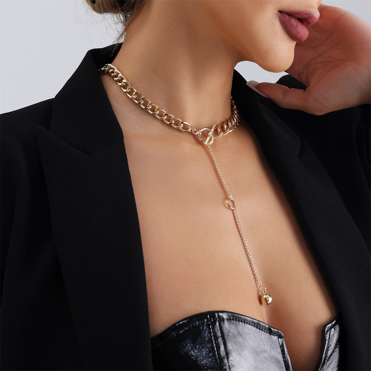 Stunning gold chain bracelet adorned with a small charm, ideal for elevating your jewelry collection.