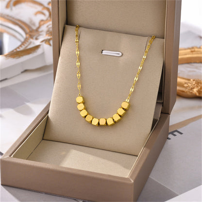 18K Gold-Plated Cube Necklace, gold pendant necklace for women, dainty minimalist design, lifestyle look