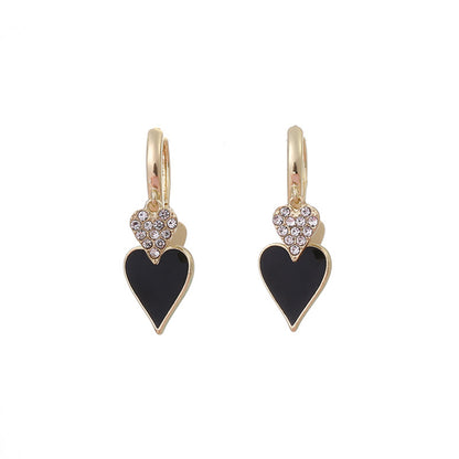 Black Enamel and Cubic Zirconia 18K Gold-Plated Hearts Huggie Earrings, gold huggie earrings, lifestyle look