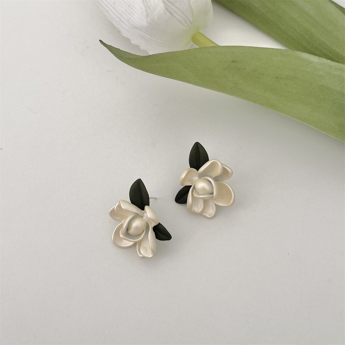 Pink Enamel and Silver-Plated Flower Stud Earrings, silver stud earrings for women, botanical inspired, detail close-up
