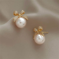 Cubic Zirconia & Pearl Bow Stud Earrings