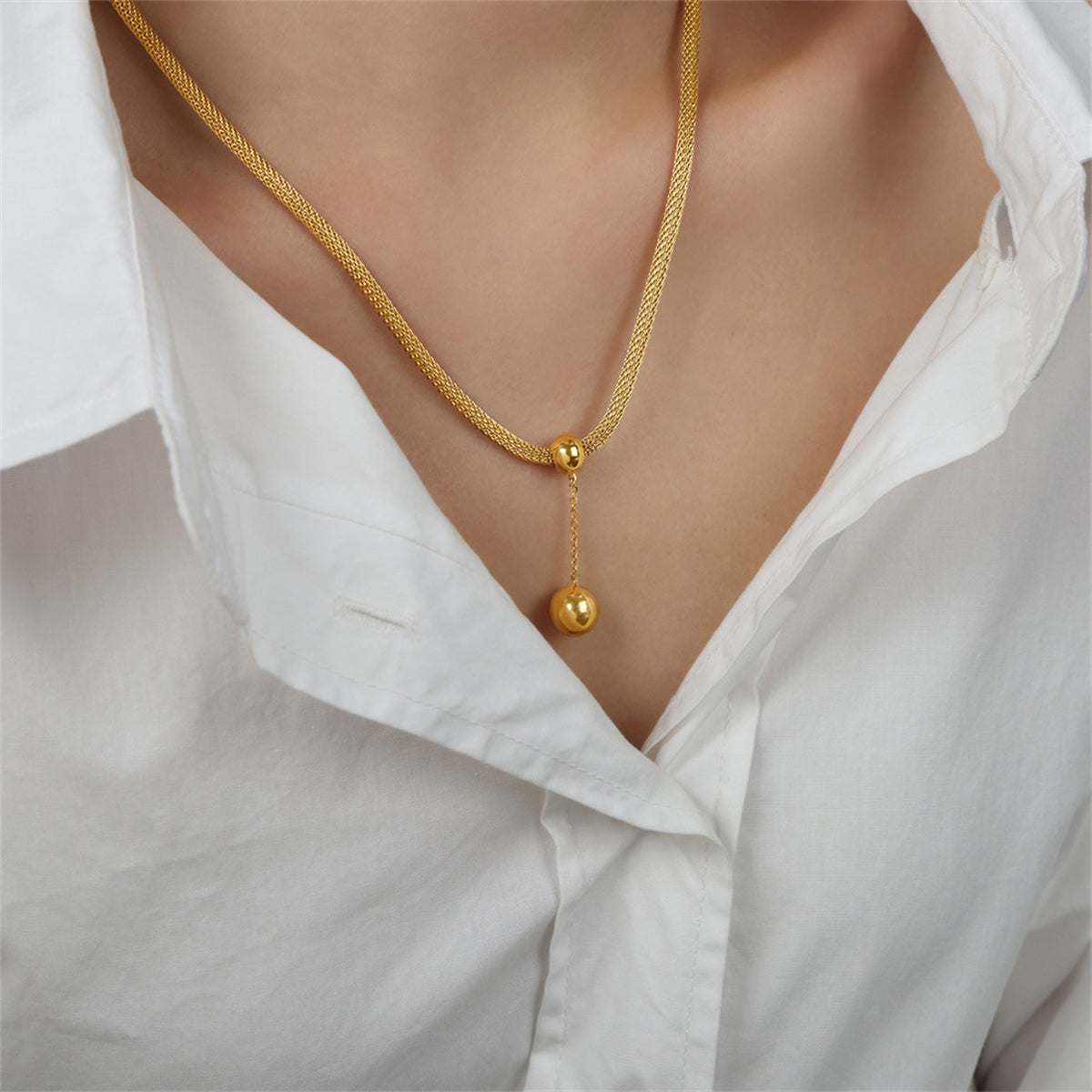 Chic 18K gold-plated necklace with a ball pendant and mesh chain, ideal for elevating your jewelry collection.