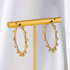 Chic 18K gold-plated hoop earrings embellished with small balls, ideal for elevating your everyday jewelry collection.