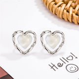 Quartz & Silver-Plated Openwork Heart Stud Earrings