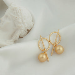 Beautiful 18K gold-plated earrings showcasing a stylish circle and cross design, ideal for elevating your outfit.
