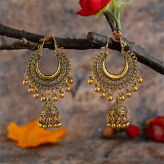 Elegant 18K gold-plated jhumka earrings adorned with beads, perfect for adding a touch of glamour to any outfit.