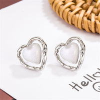 Quartz & Silver-Plated Openwork Heart Stud Earrings