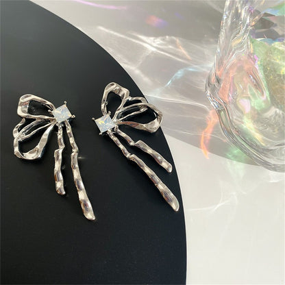 Cubic Zirconia and Silver-Plated Butterfly Stud Earrings, silver stud earrings for women, botanical inspired, side view