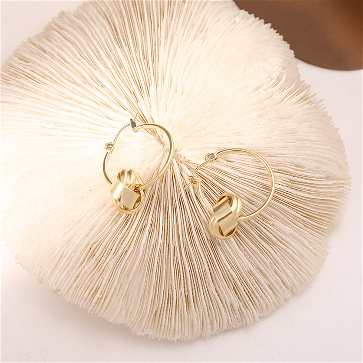 18K Gold-Plated Knot Huggie Earrings, gold huggie earrings, botanical inspired, lifestyle look
