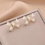 White Enamel & Pearl Bow Stud Earrings
