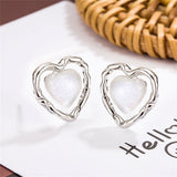 Quartz & Silver-Plated Openwork Heart Stud Earrings
