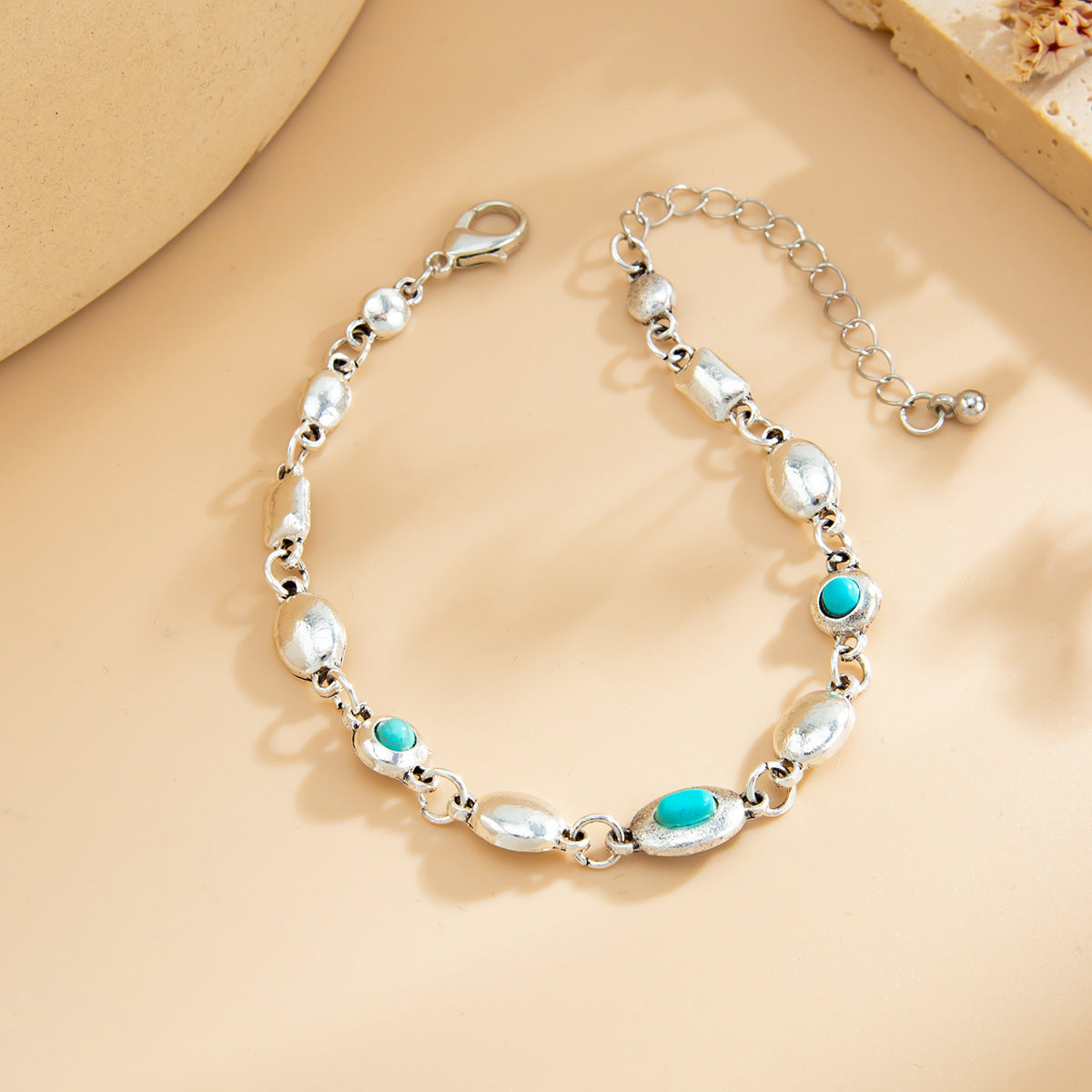 Turqouise and Silvertone Oval Round Station Bracelet, silver bracelet for women, everyday style, side view