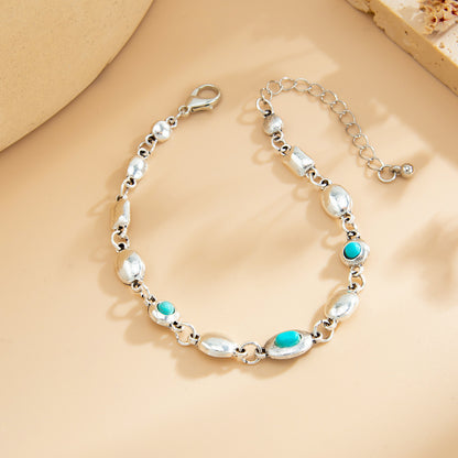 Turqouise and Silvertone Oval Round Station Bracelet, silver bracelet for women, everyday style, side view