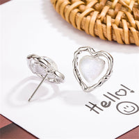 Quartz & Silver-Plated Openwork Heart Stud Earrings