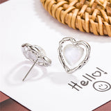 Quartz & Silver-Plated Openwork Heart Stud Earrings
