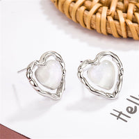 Quartz & Silver-Plated Openwork Heart Stud Earrings