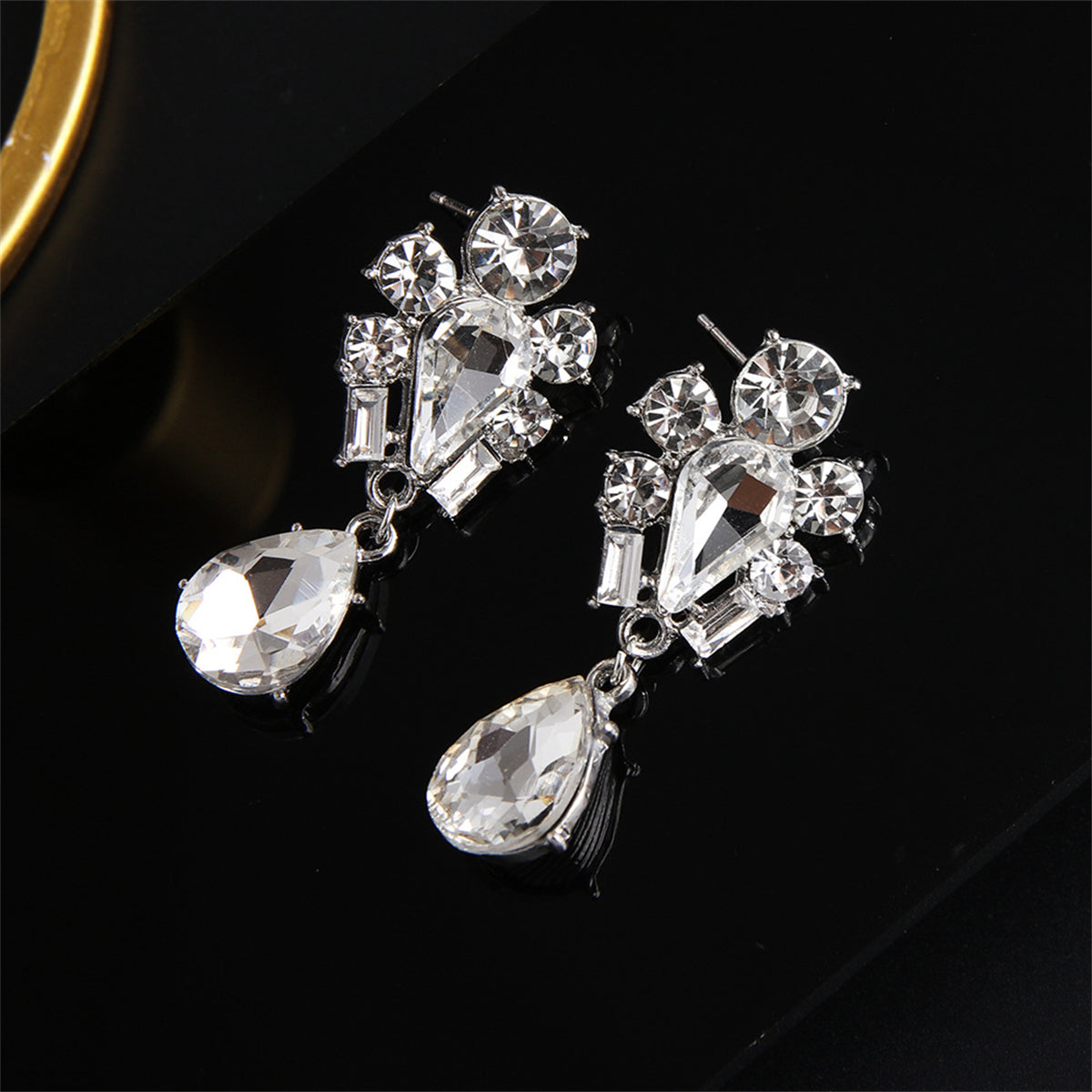 Crystal and Cubic Zirconia Silver-Plated Pear Drop Earrings, silver drop earrings for women, everyday style, detail close-up