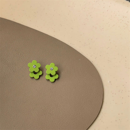 Cubic Zirconia and Green Enamel Flower Stud Earrings, stud earrings for women, dainty minimalist design, detail close-up