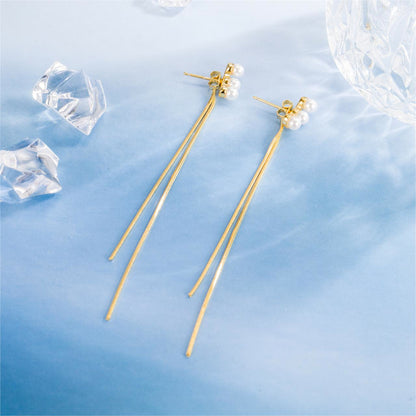 Pearl and 18K Gold-Plated Tassel Ear Jackets, gold drop earrings for women, dainty minimalist design, side view