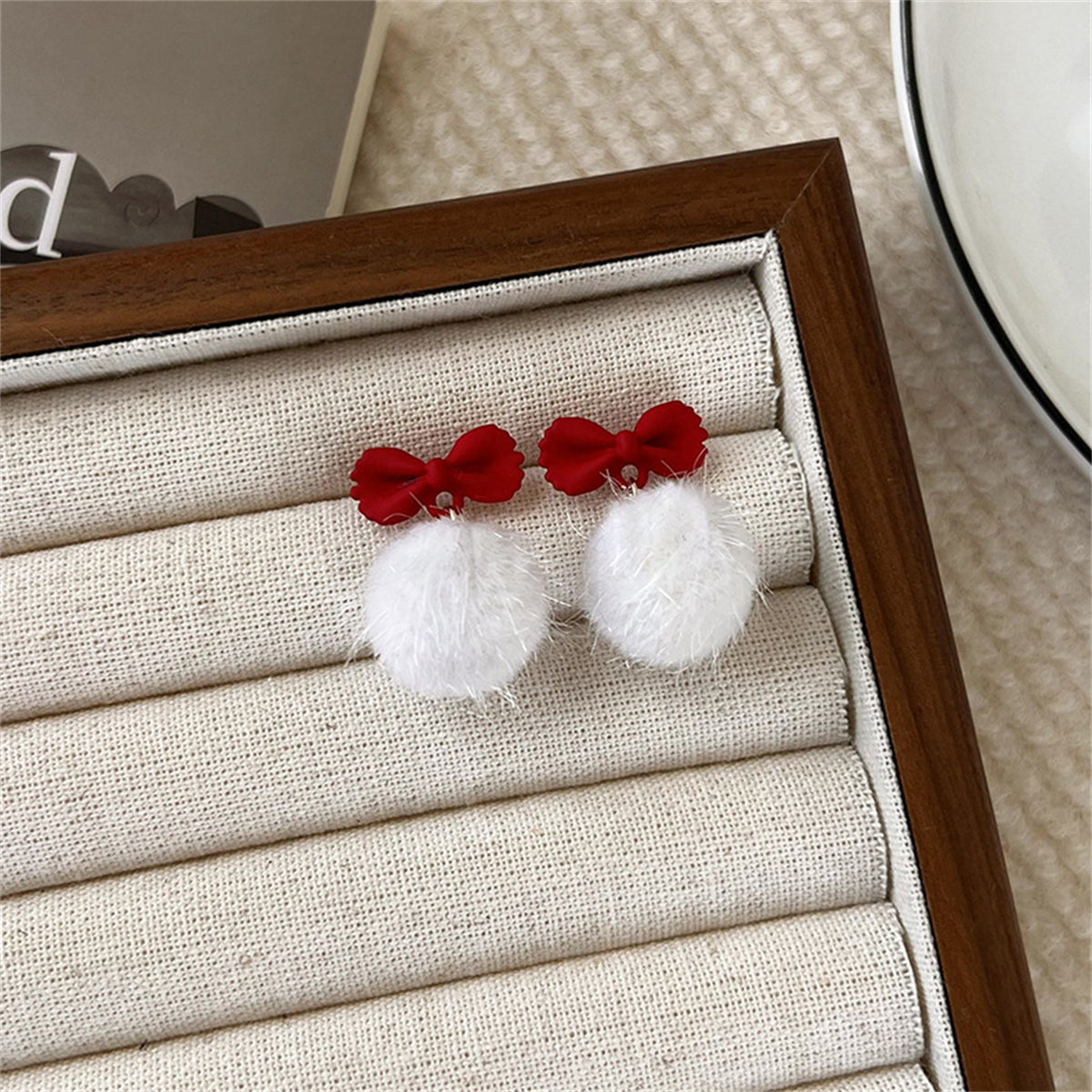 Red Enamel and White Pom-Pom Bow Drop Earrings, drop earrings for women, vintage-inspired design, side view