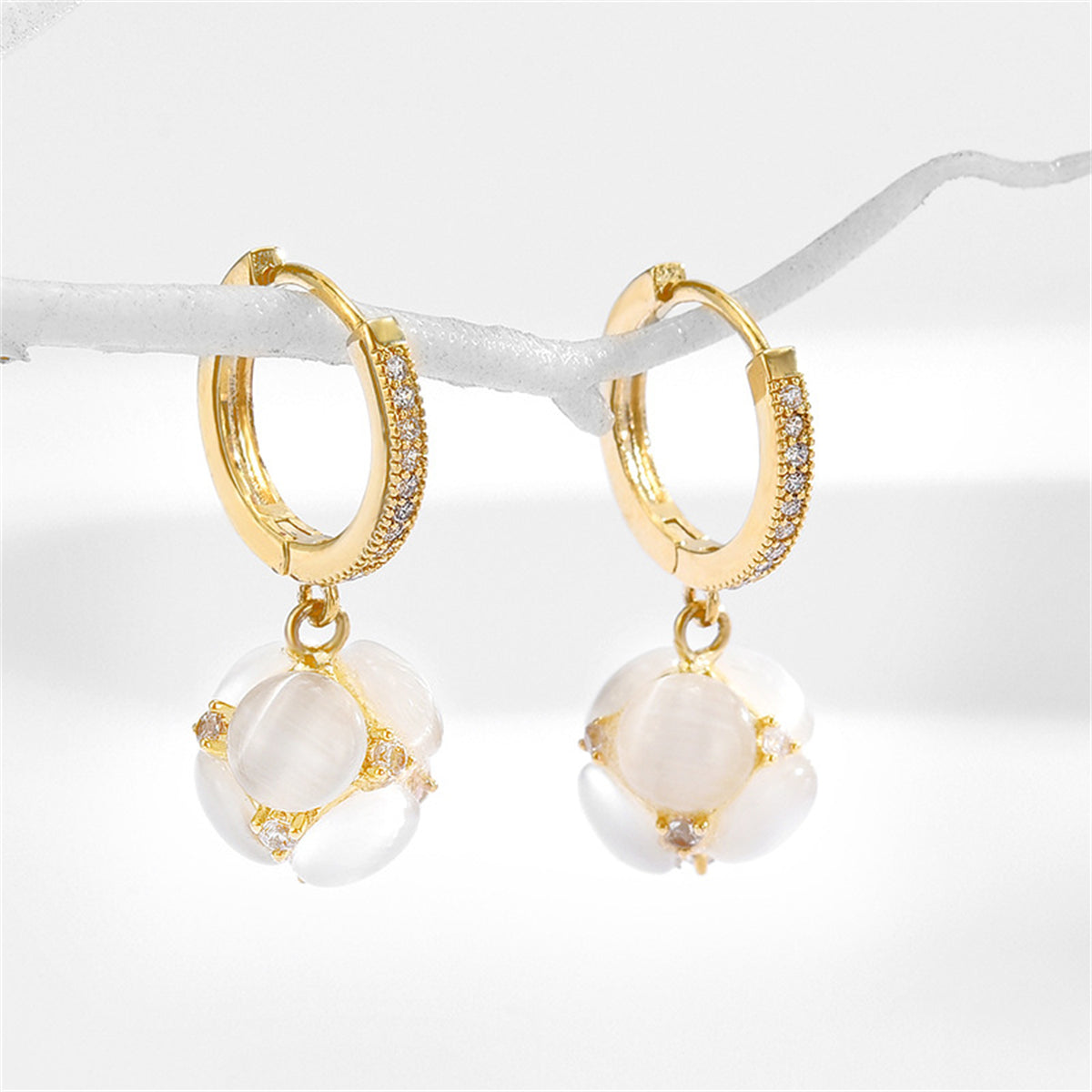 Cubic Zirconia and Cateye Floral Huggie Earrings, huggie earrings, vintage-inspired design, side view