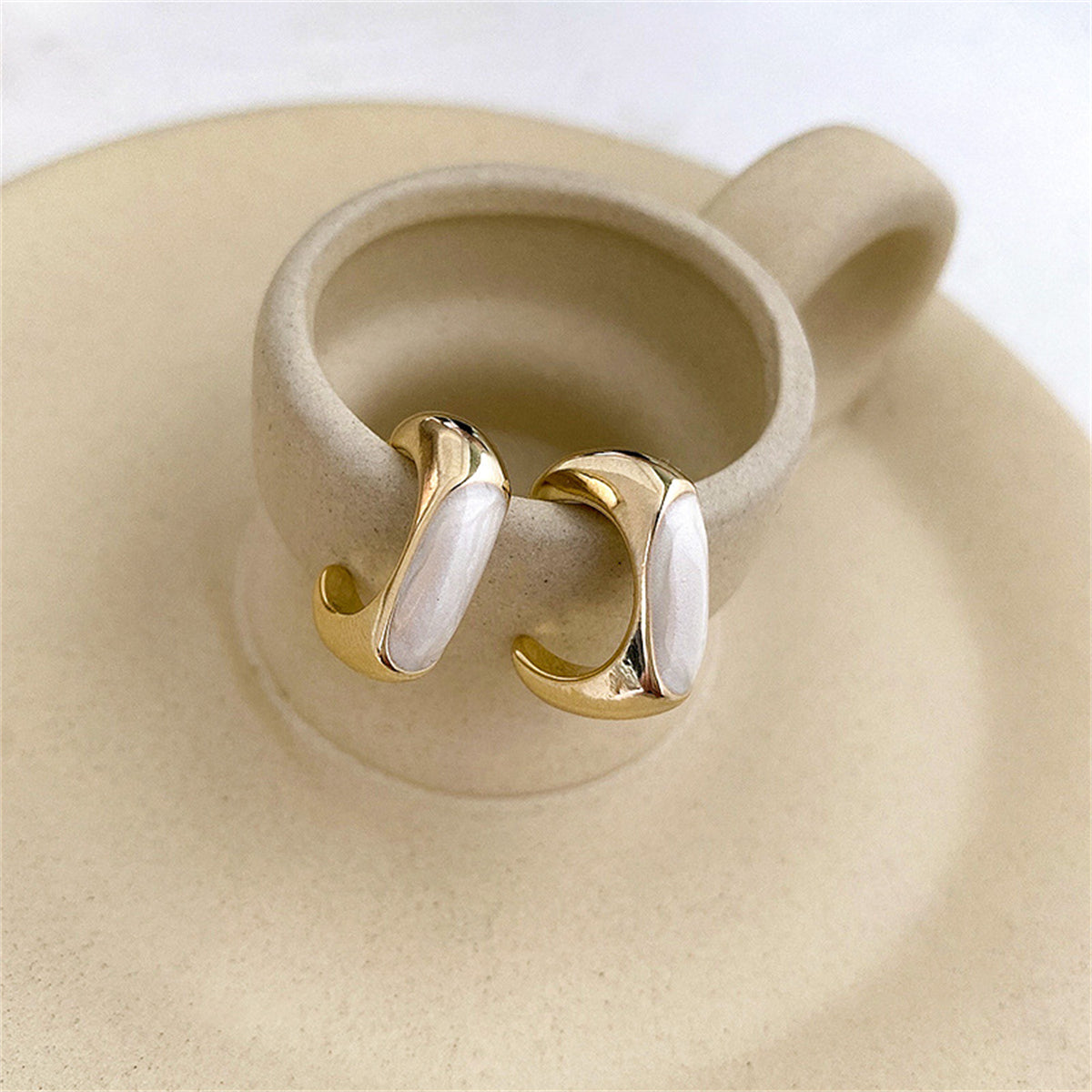 Enamel and 18K Gold-Plated C-Shaped Huggie Earrings, gold huggie earrings, everyday style, detail close-up