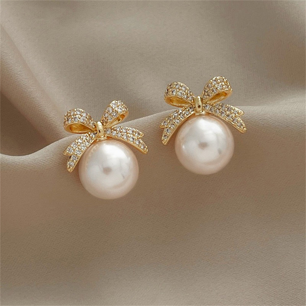 Cubic Zirconia & Pearl Bow Stud Earrings