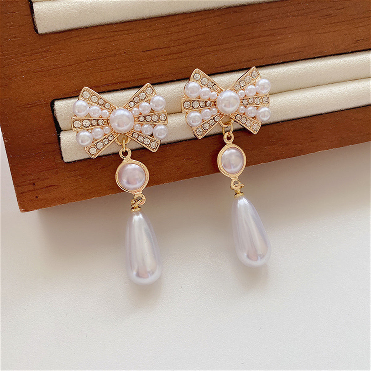 White Cubic Zirconia and Pearl 18K Gold-Plated Bow Drop Earrings, gold drop earrings for women, lifestyle look