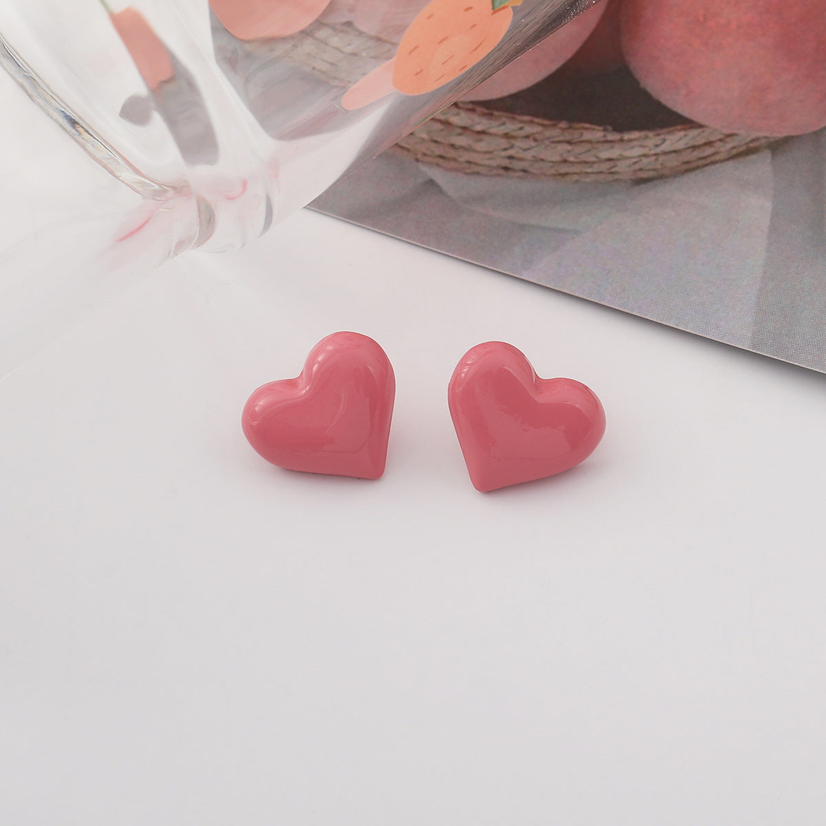 Pink Enamel and Silver-Plated Heart Stud Earrings, silver stud earrings for women, vintage-inspired design, side view