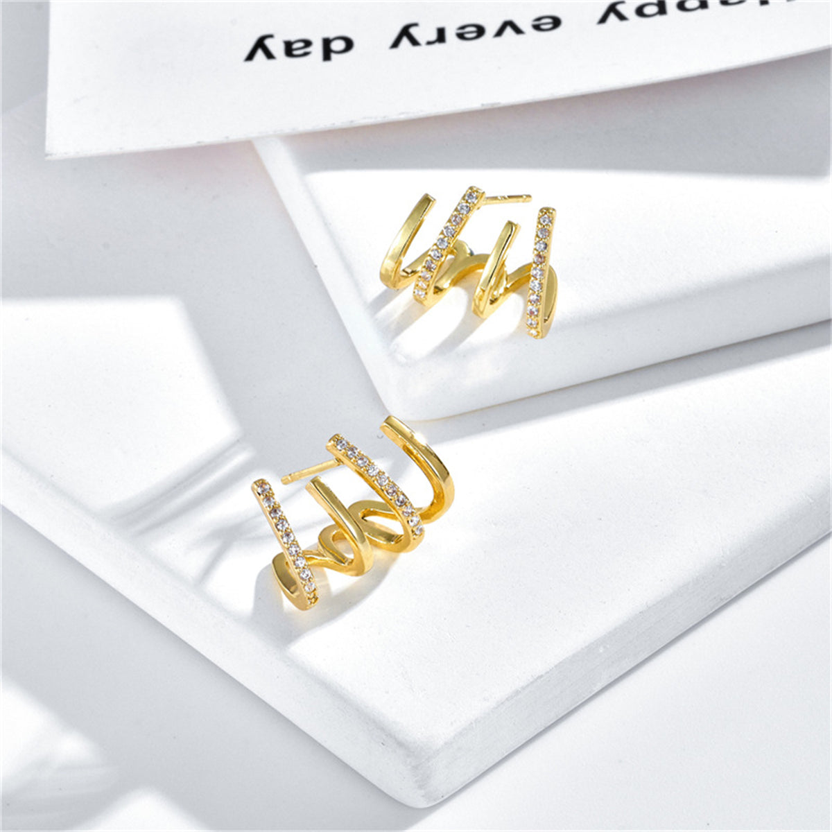 Cubic Zirconia and 18K Gold-Plated Pav¨¦ Prong Stud Earrings, gold stud earrings for women, everyday style, detail close-up