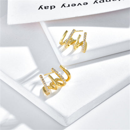 Cubic Zirconia and 18K Gold-Plated Pav¨¦ Prong Stud Earrings, gold stud earrings for women, everyday style, detail close-up