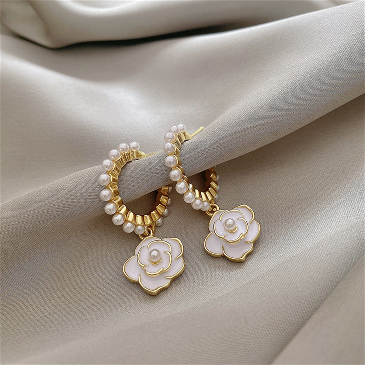 Pearl and White Enamel 18K Gold-Plated Flower Huggie Earrings, gold huggie earrings, dainty minimalist design, side view