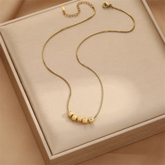 Dazzling 18K gold-plated necklace with four elegant beads, a timeless piece to complement any ensemble beautifully.