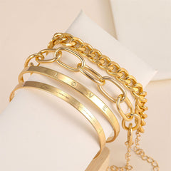 Exquisite 18K gold-plated 'Love' cuff set, featuring three stylish chain bracelets with a heart charm for added elegance.