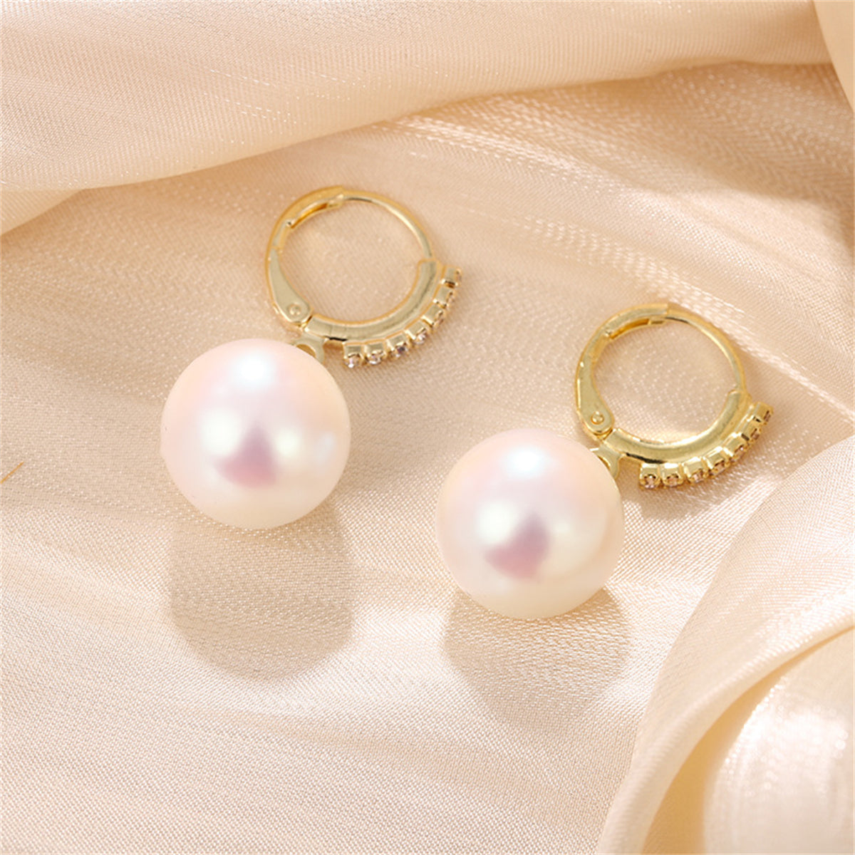 Cubic Zirconia and Pearl Huggie Drop Earrings, huggie earrings, dainty minimalist design, detail close-up