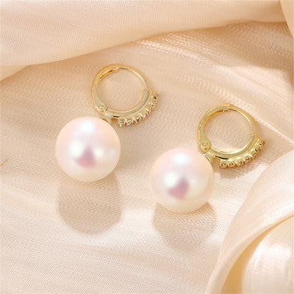 Cubic Zirconia and Pearl Huggie Drop Earrings, huggie earrings, dainty minimalist design, detail close-up