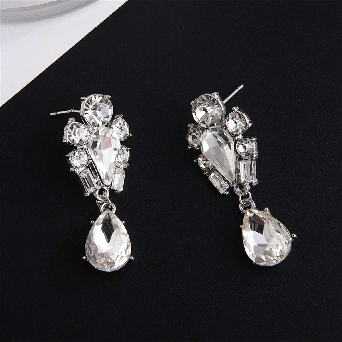 Crystal and Cubic Zirconia Silver-Plated Pear Drop Earrings, silver drop earrings for women, everyday style, lifestyle look
