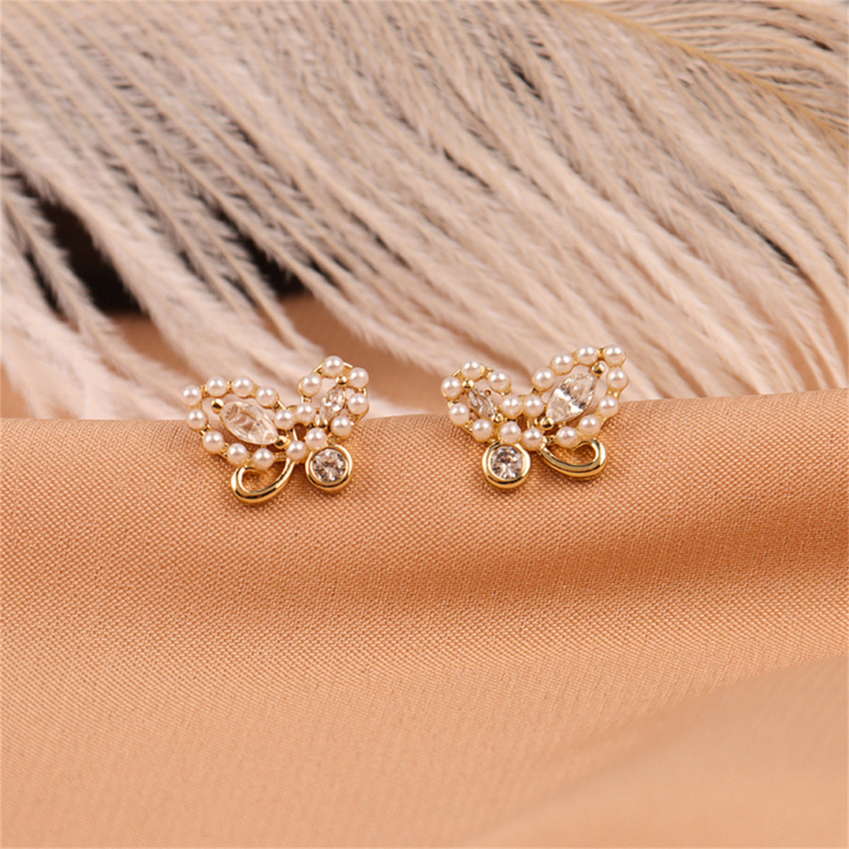 Pearl and Cubic Zirconia Embellished Butterfly Stud Earrings, stud earrings for women, detail close-up