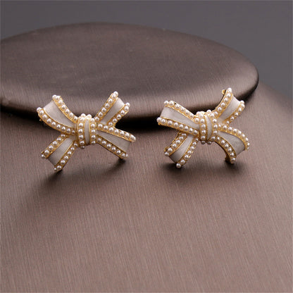 White Enamel and Pearl Bow Stud Earrings, stud earrings for women, everyday style, lifestyle look