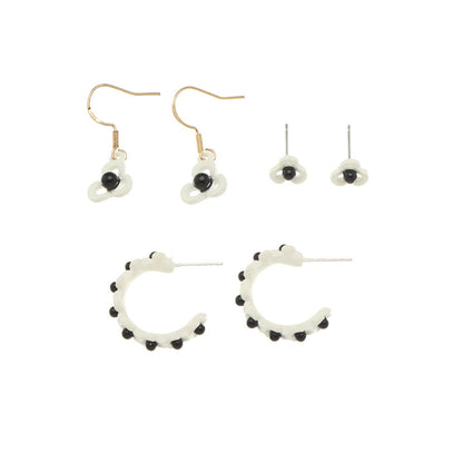 Black and White Floral Openwork Earring Set, huggie earrings, dainty minimalist design, styled look