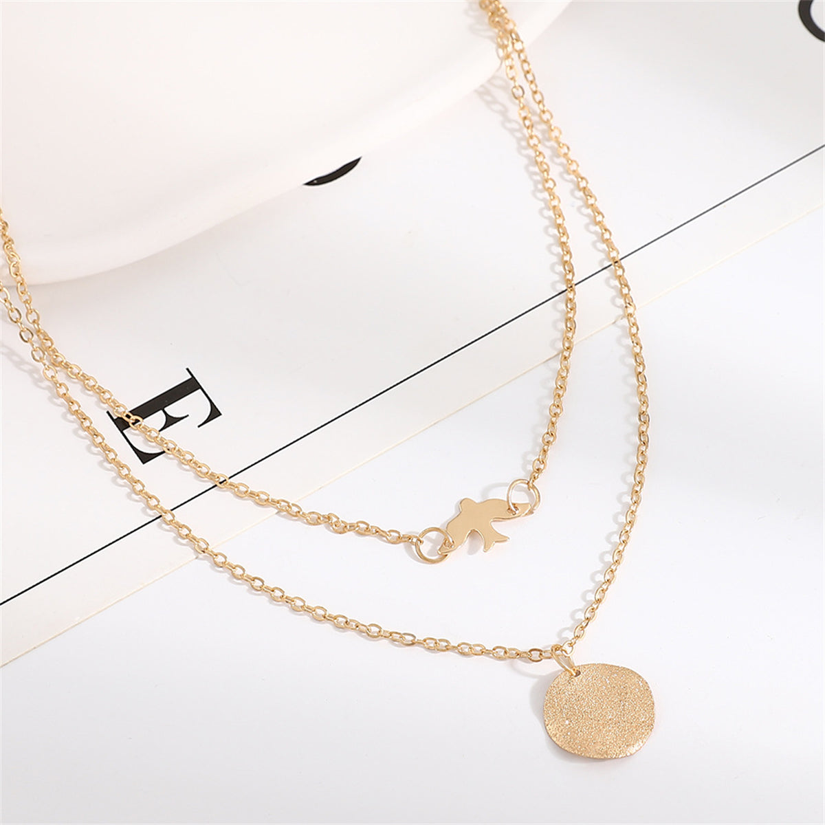 Two beautiful gold-plated necklaces showcasing a bird charm, designed to enhance your style with a touch of elegance.