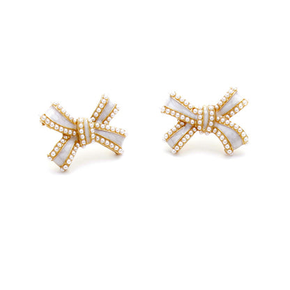 White Enamel and Pearl Bow Stud Earrings, stud earrings for women, everyday style, front view