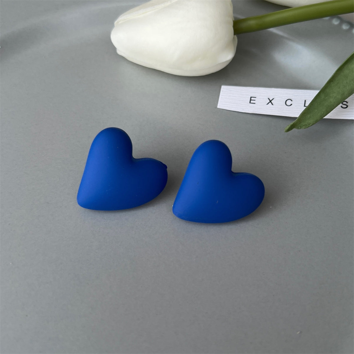 Blue Acrylic and Silve-Plated Heart Stud Earrings, stud earrings for women, dainty minimalist design, lifestyle look