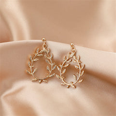 Exquisite 18K gold-plated earrings showcasing a botanical wreath with leaf motifs, perfect for adding charm to your outfit.